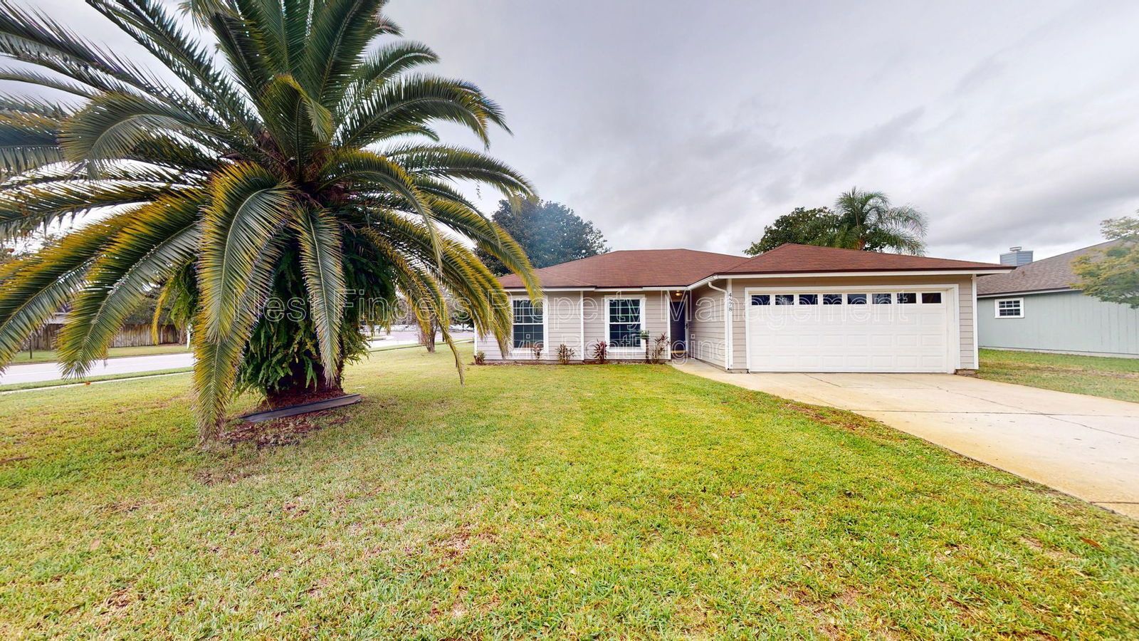 Charming 3BR/2BA corner-lot home with vaulted ceilings, fireplace, and spacious fenced yard. property image