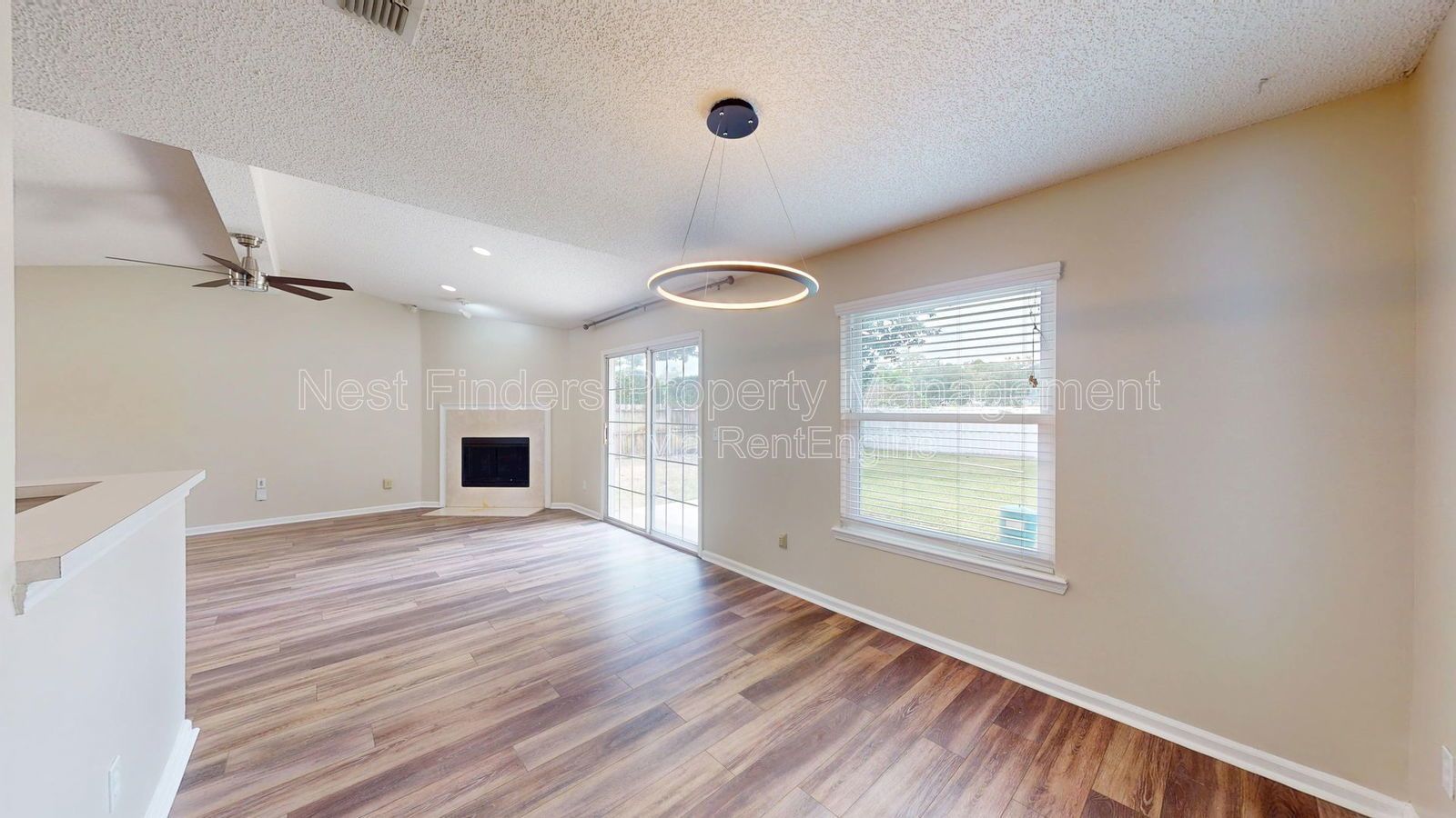 Charming 3BR/2BA corner-lot home with vaulted ceilings, fireplace, and spacious fenced yard. property image