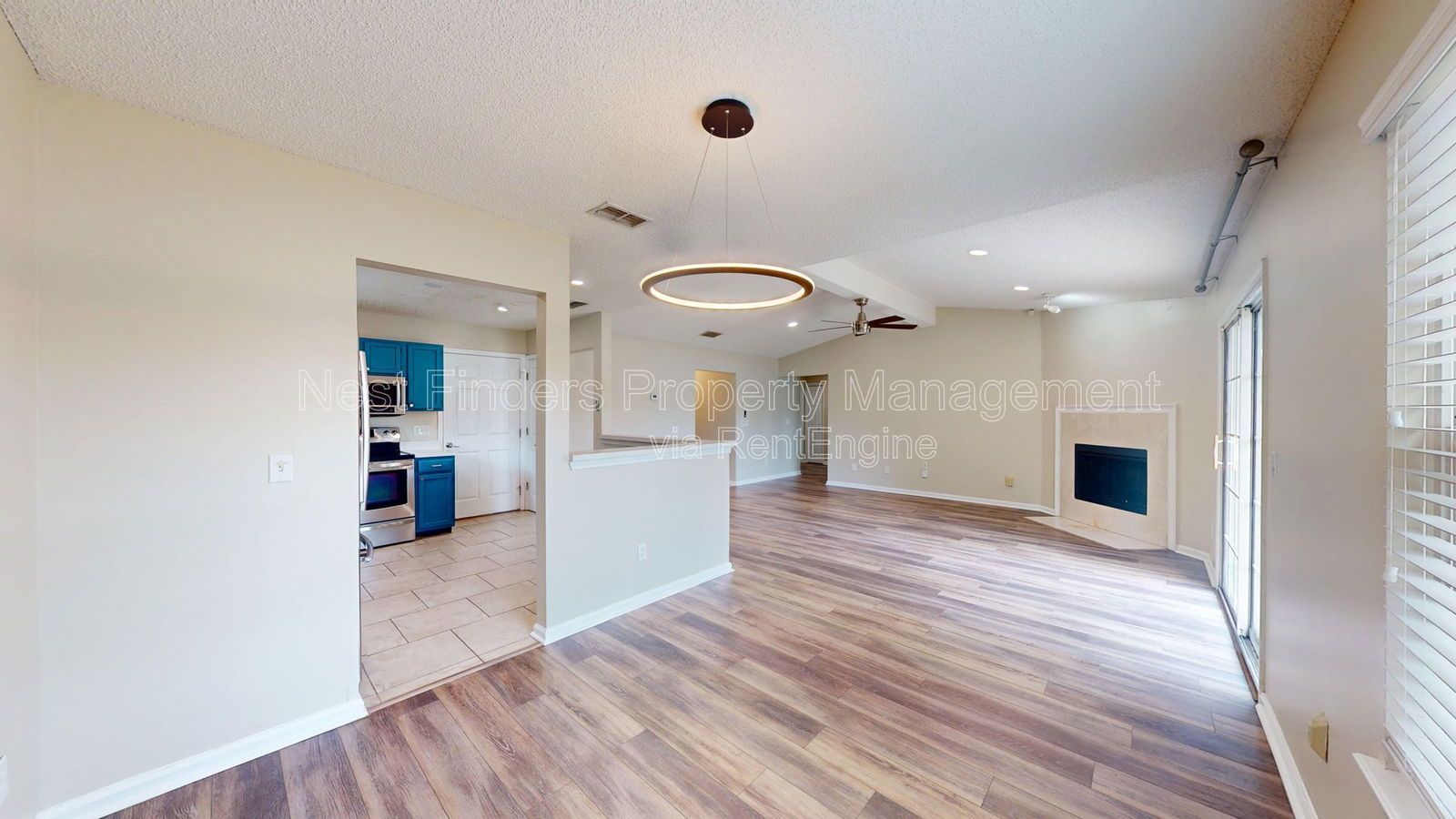 Charming 3BR/2BA corner-lot home with vaulted ceilings, fireplace, and spacious fenced yard. property image