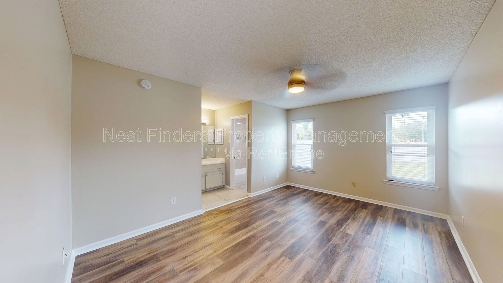 Charming 3BR/2BA corner-lot home with vaulted ceilings, fireplace, and spacious fenced yard. property image