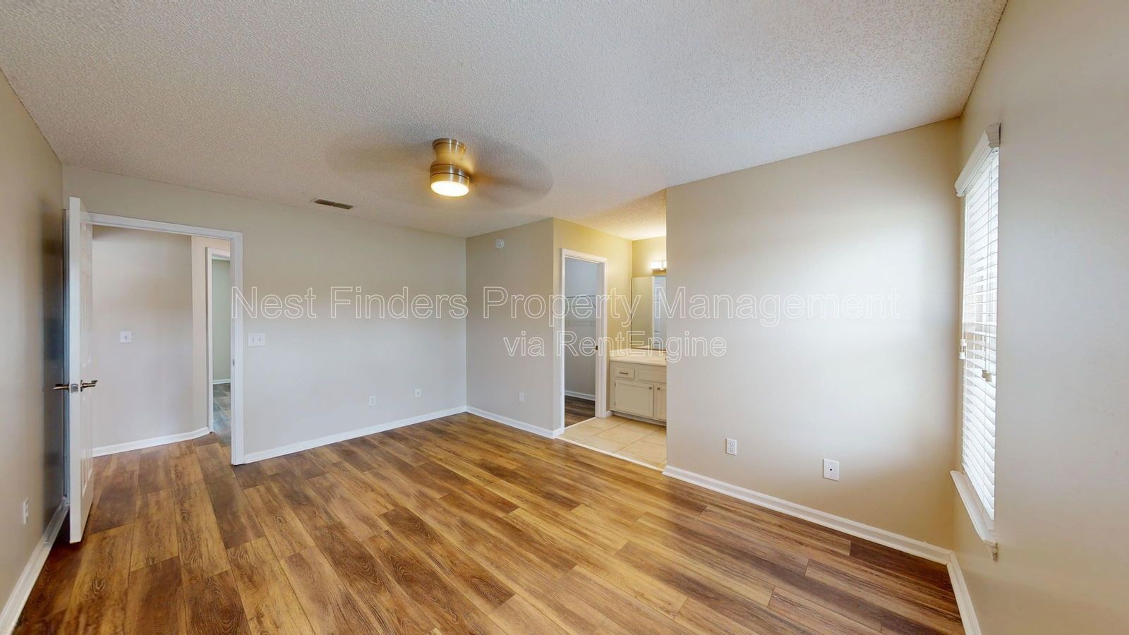 Charming 3BR/2BA corner-lot home with vaulted ceilings, fireplace, and spacious fenced yard. property image