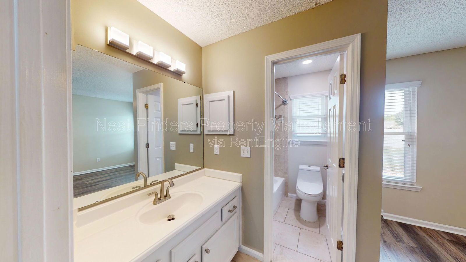 Charming 3BR/2BA corner-lot home with vaulted ceilings, fireplace, and spacious fenced yard. property image