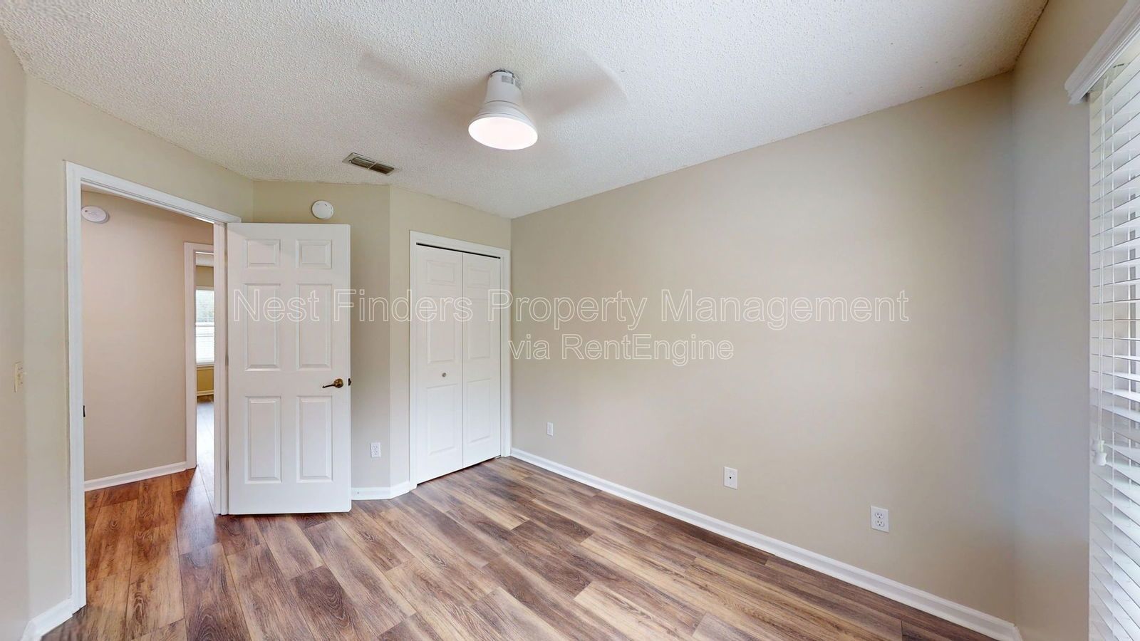 Charming 3BR/2BA corner-lot home with vaulted ceilings, fireplace, and spacious fenced yard. property image