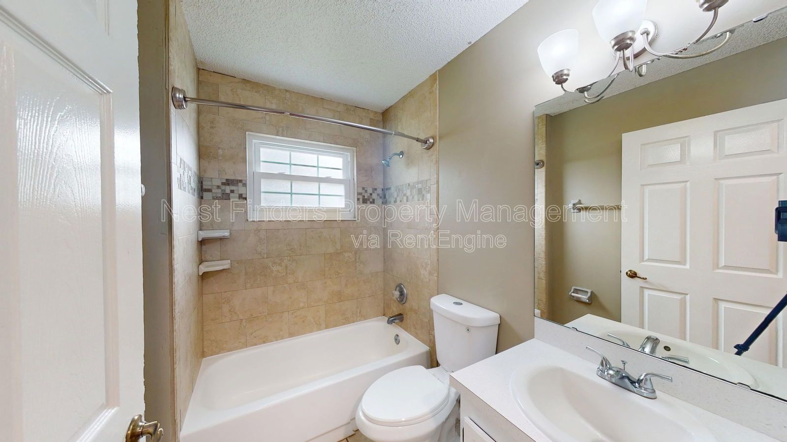 Charming 3BR/2BA corner-lot home with vaulted ceilings, fireplace, and spacious fenced yard. property image