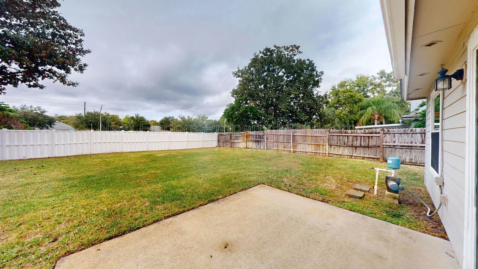 Charming 3BR/2BA corner-lot home with vaulted ceilings, fireplace, and spacious fenced yard. property image