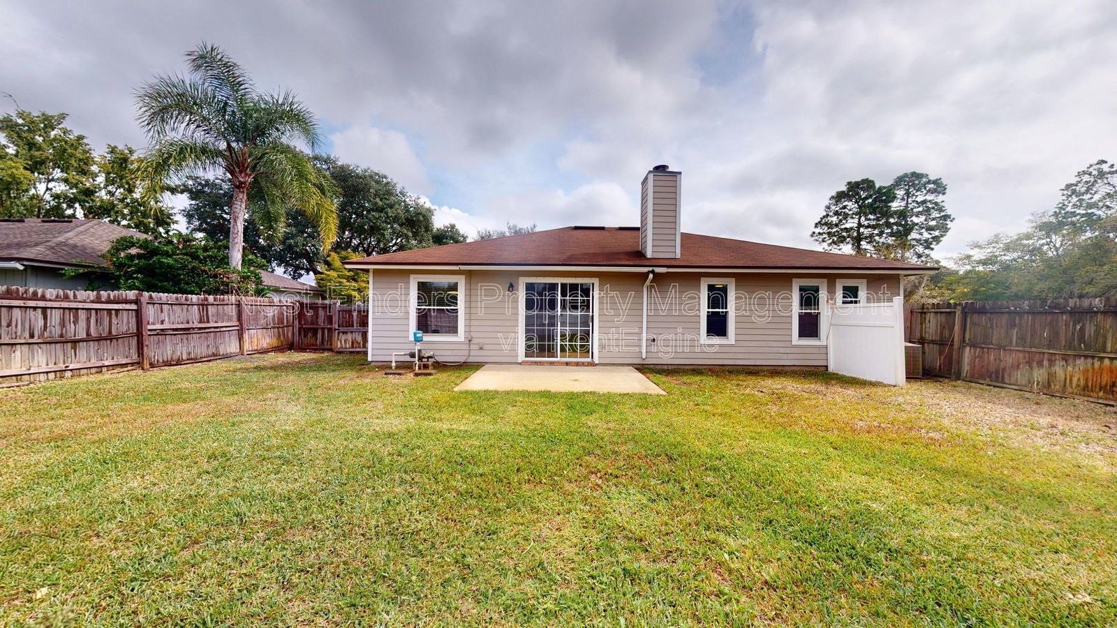 Charming 3BR/2BA corner-lot home with vaulted ceilings, fireplace, and spacious fenced yard. property image