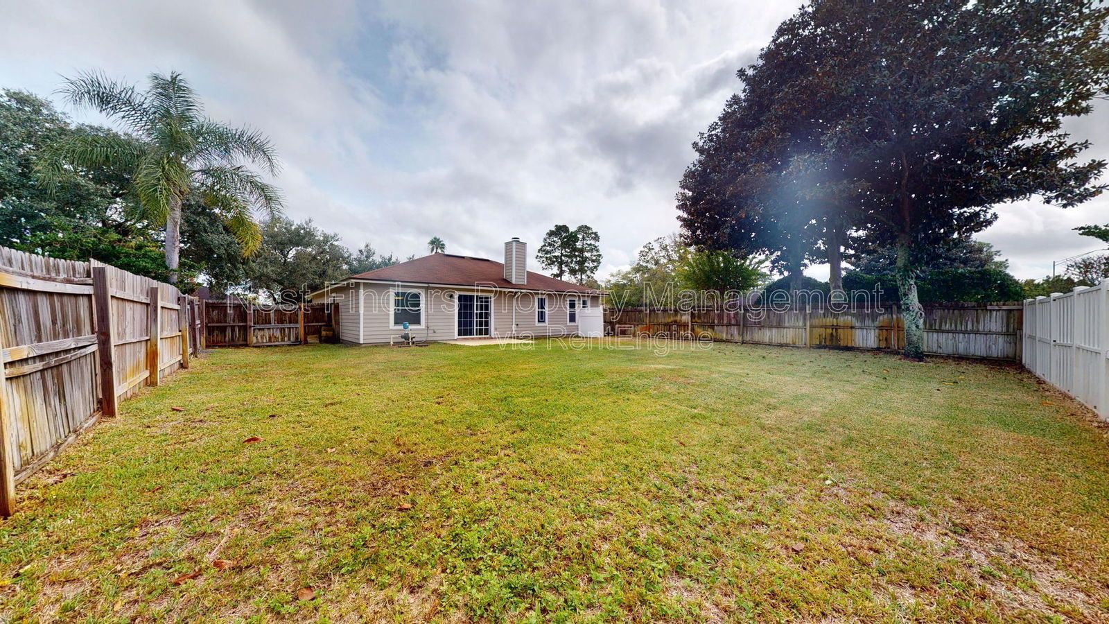 Charming 3BR/2BA corner-lot home with vaulted ceilings, fireplace, and spacious fenced yard. property image
