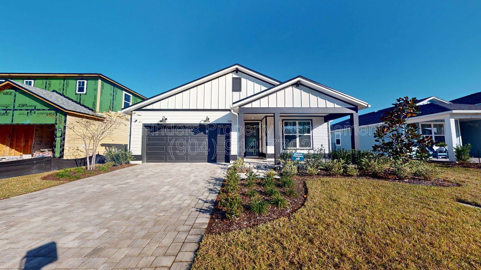 Like-new 4 bedroom, 2 bathroom home in Saint Johns features a coastal-style exterior! property image