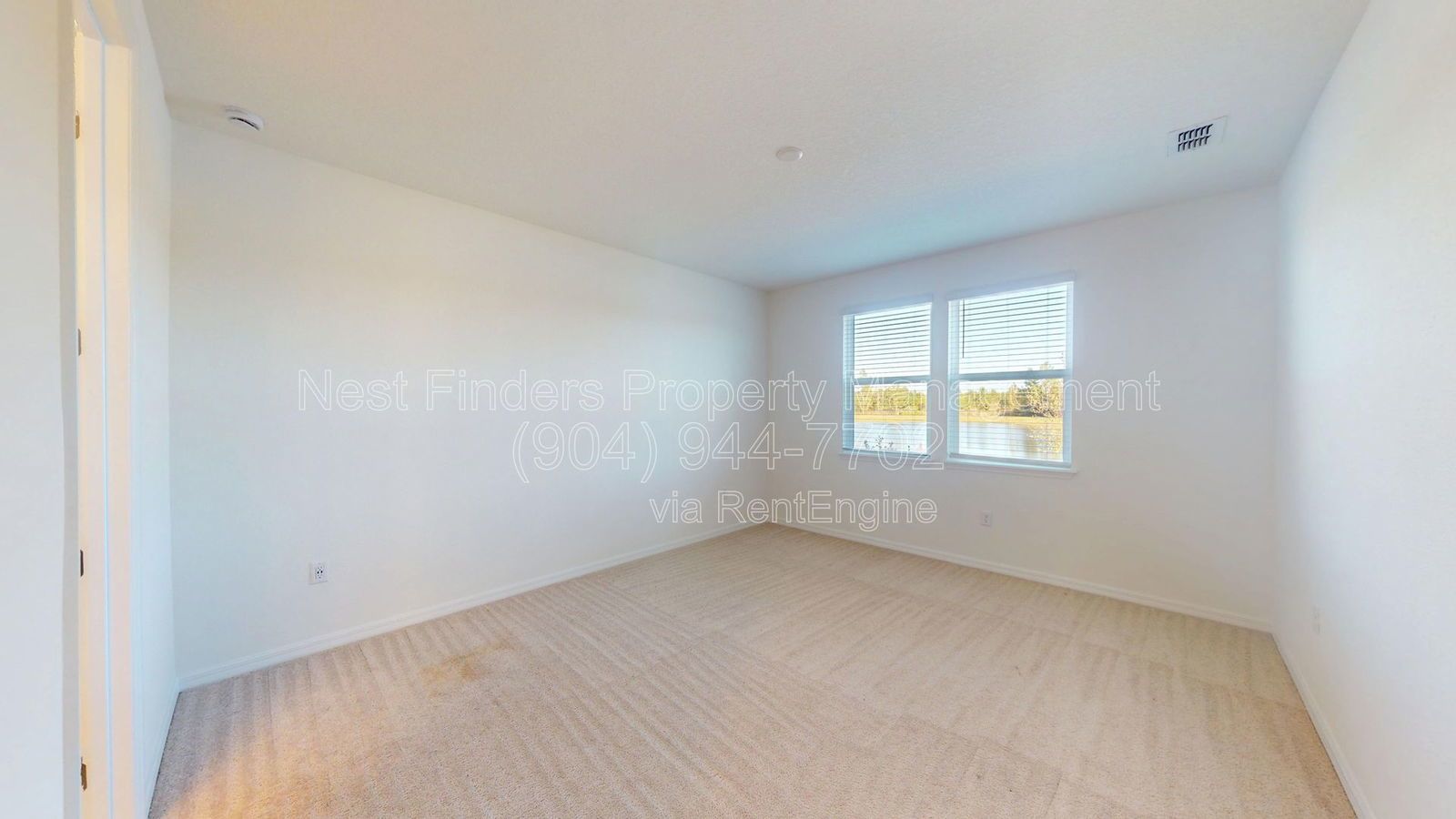 Like-new 4 bedroom, 2 bathroom home in Saint Johns features a coastal-style exterior! property image