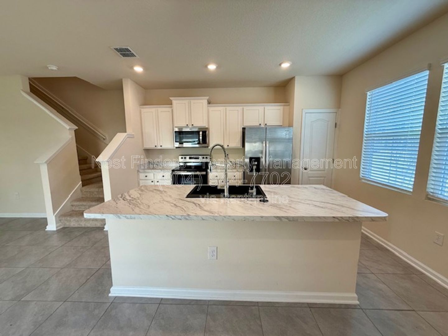 Charming three-bedroom, 2.5-bathroom end-unit townhome for rent in the desirable Rivergate community property image