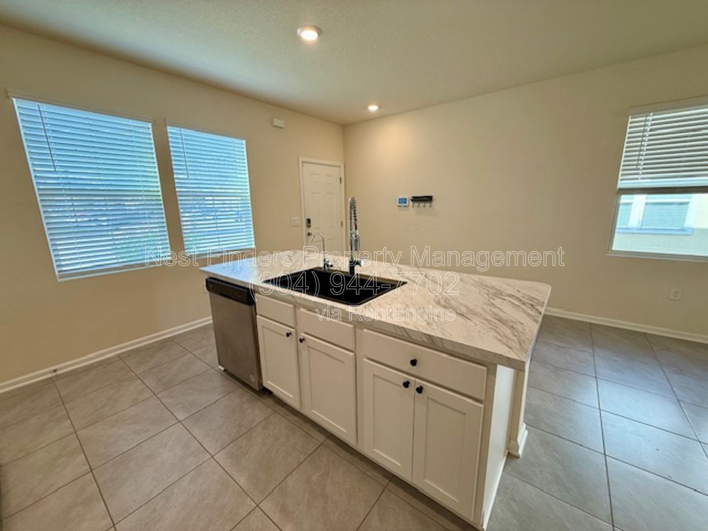 Charming three-bedroom, 2.5-bathroom end-unit townhome for rent in the desirable Rivergate community property image