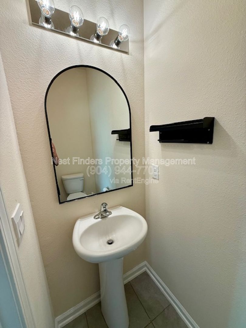 Charming three-bedroom, 2.5-bathroom end-unit townhome for rent in the desirable Rivergate community property image