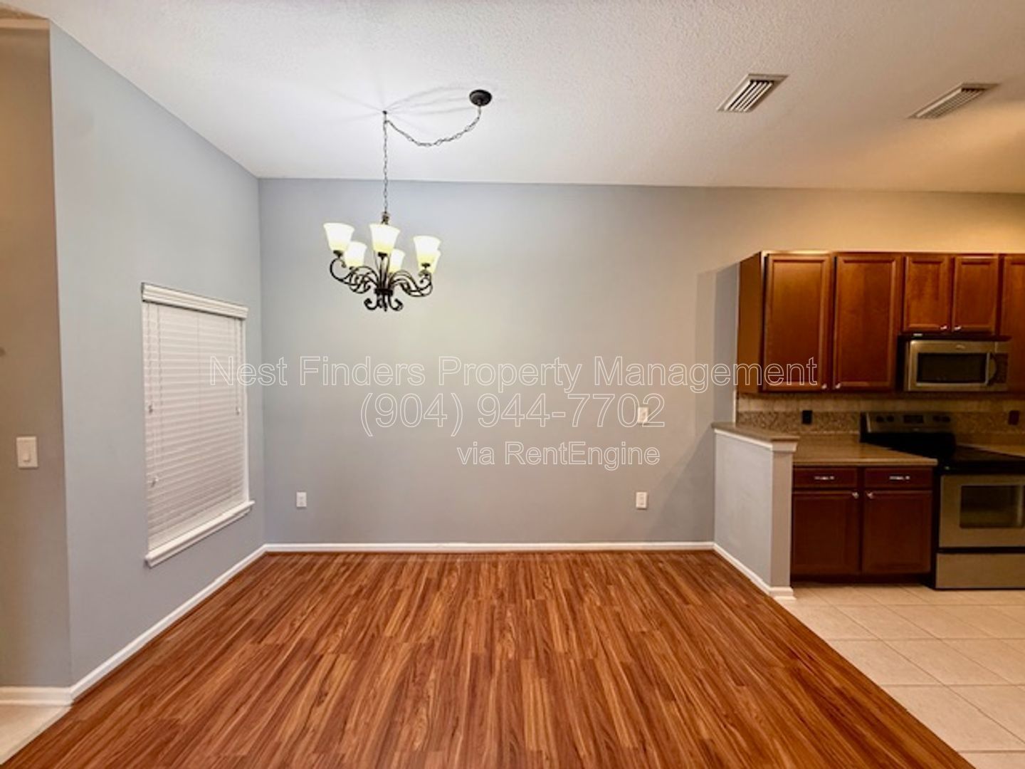 Discover the charm of this beautifully maintained 2-bedroom condominium with a private attached garage property image