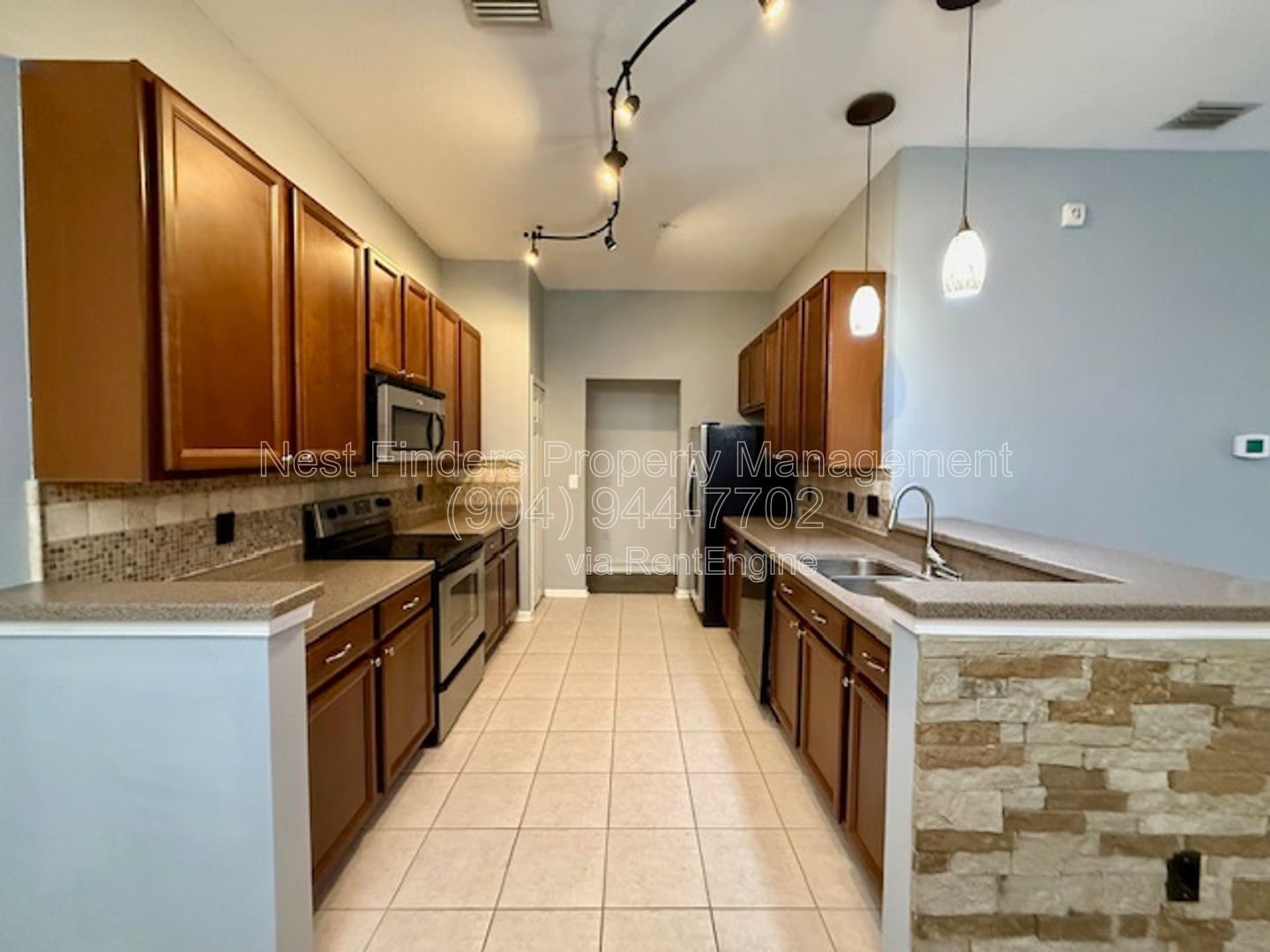 Discover the charm of this beautifully maintained 2-bedroom condominium with a private attached garage property image