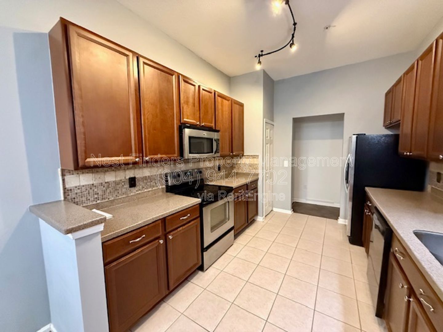 Discover the charm of this beautifully maintained 2-bedroom condominium with a private attached garage property image