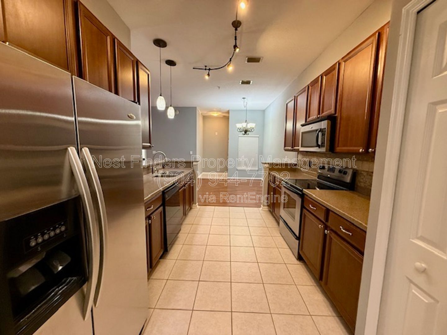 Discover the charm of this beautifully maintained 2-bedroom condominium with a private attached garage property image