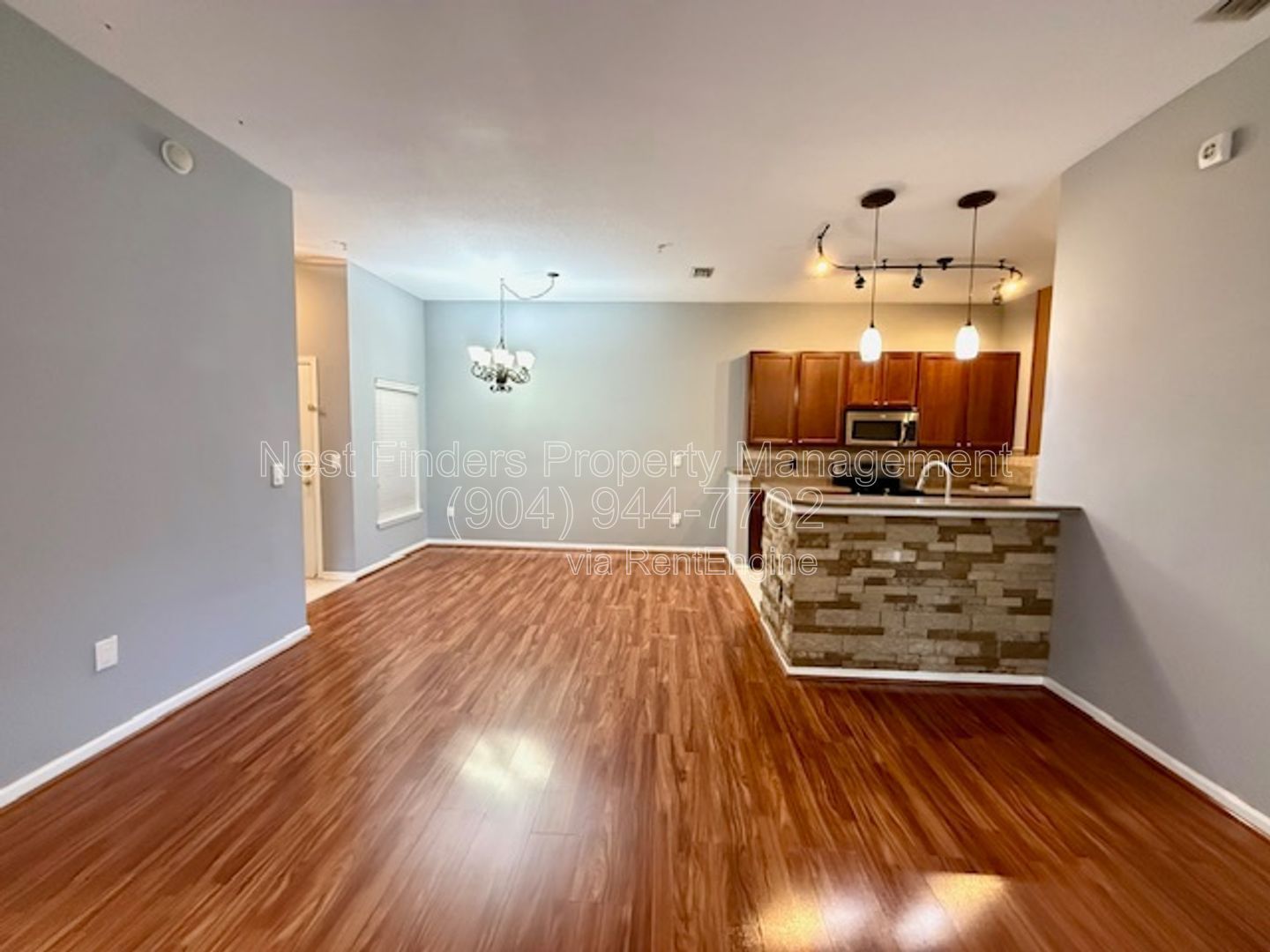 Discover the charm of this beautifully maintained 2-bedroom condominium with a private attached garage property image