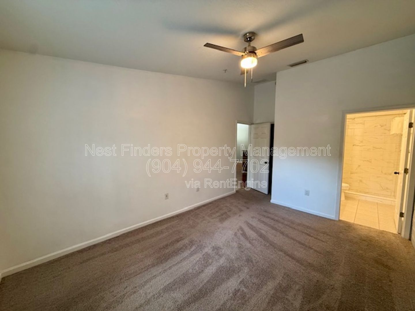 Discover the charm of this beautifully maintained 2-bedroom condominium with a private attached garage property image