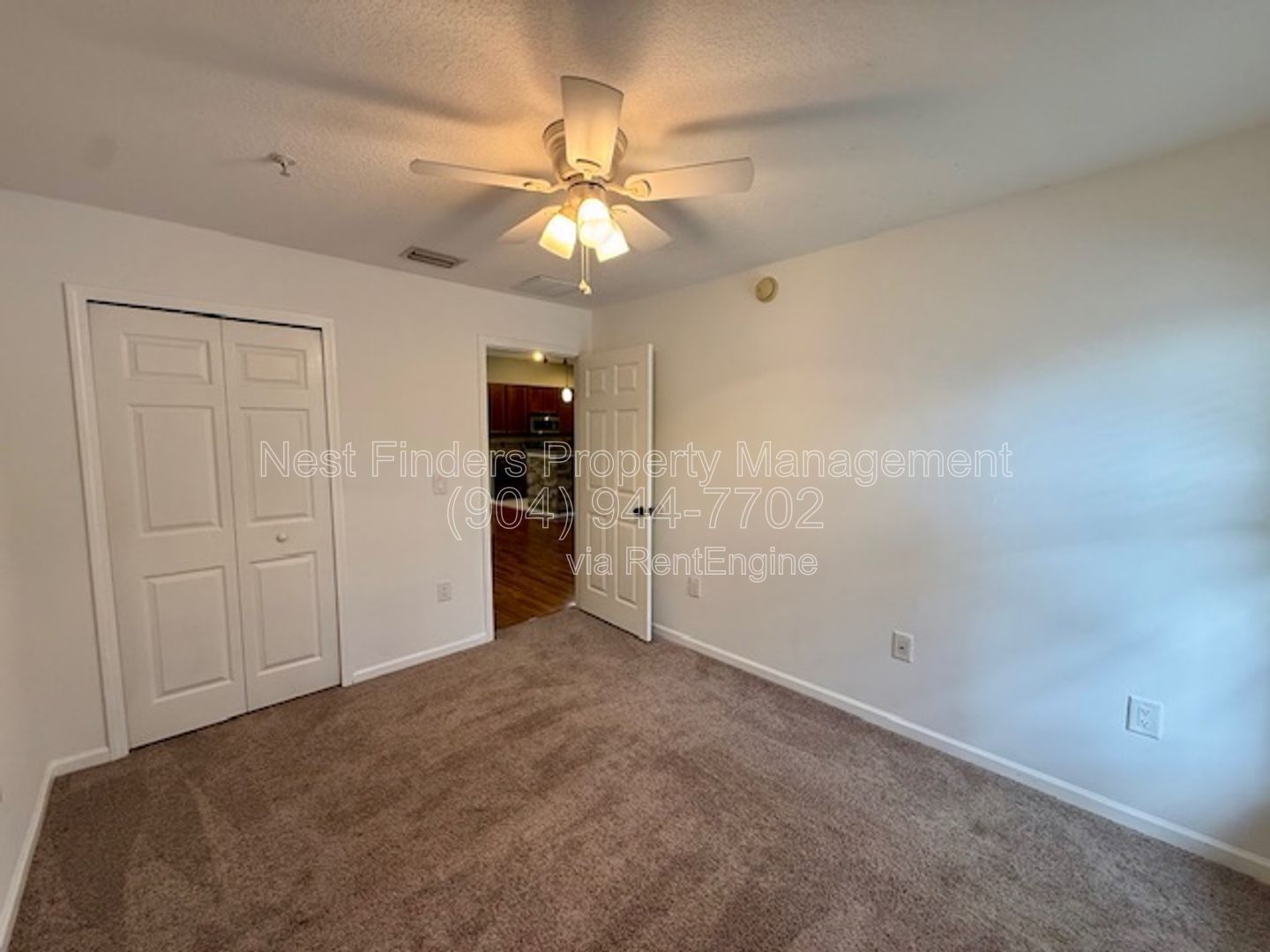 Discover the charm of this beautifully maintained 2-bedroom condominium with a private attached garage property image