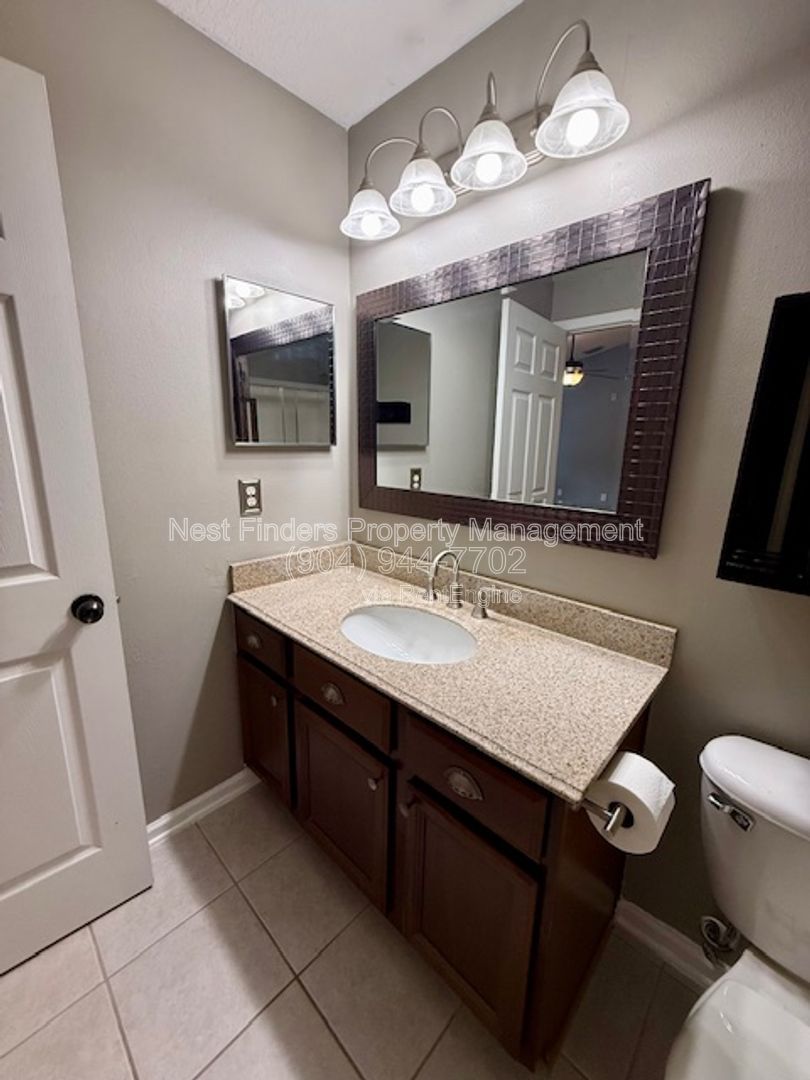 Discover the charm of this beautifully maintained 2-bedroom condominium with a private attached garage property image