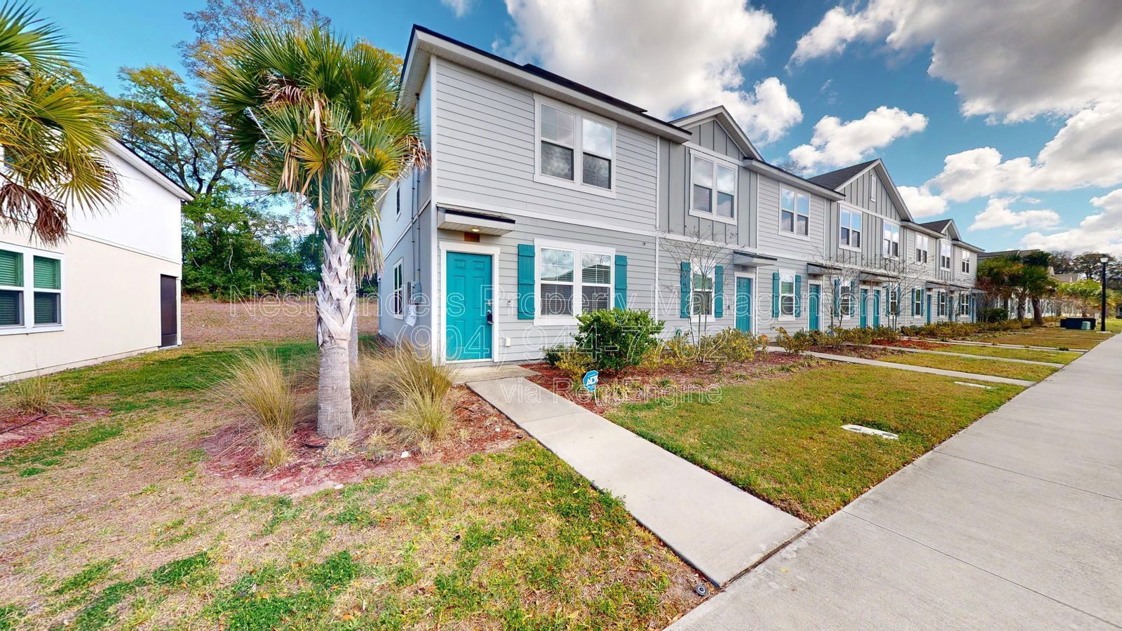 Charming three-bedroom, 2.5-bathroom end-unit townhome for rent in the desirable Rivergate community property image