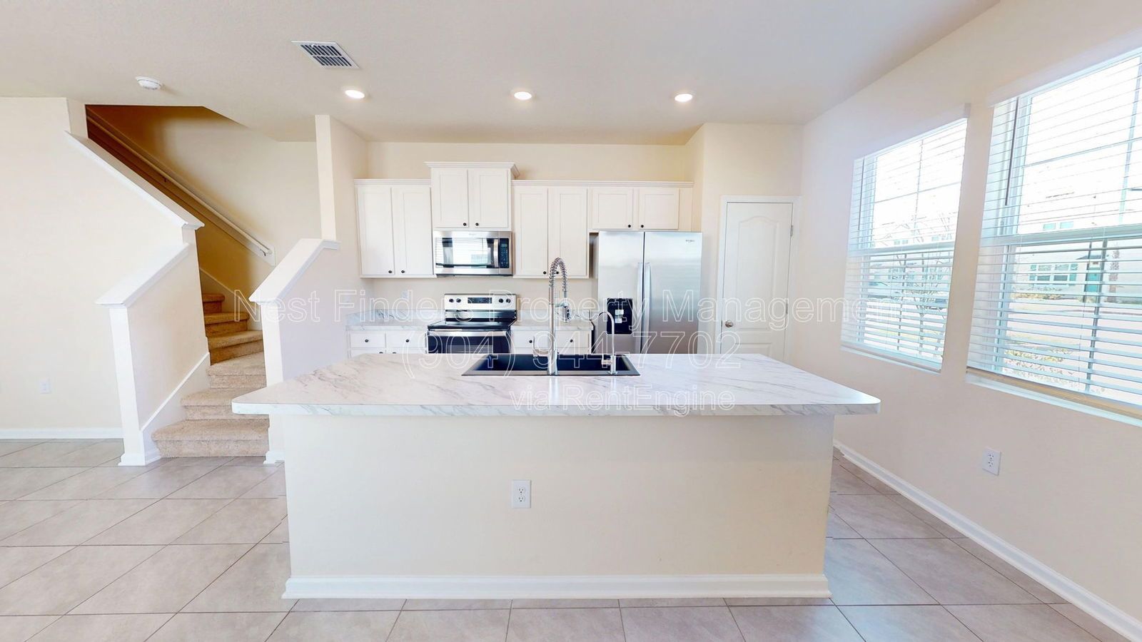 Charming three-bedroom, 2.5-bathroom end-unit townhome for rent in the desirable Rivergate community property image