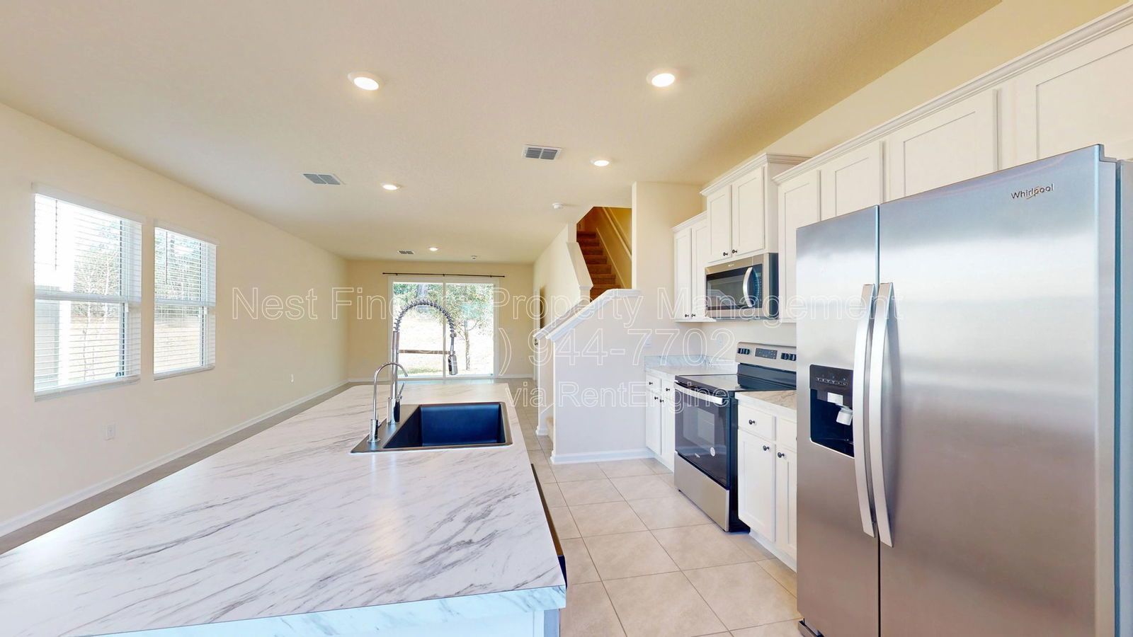 Charming three-bedroom, 2.5-bathroom end-unit townhome for rent in the desirable Rivergate community property image