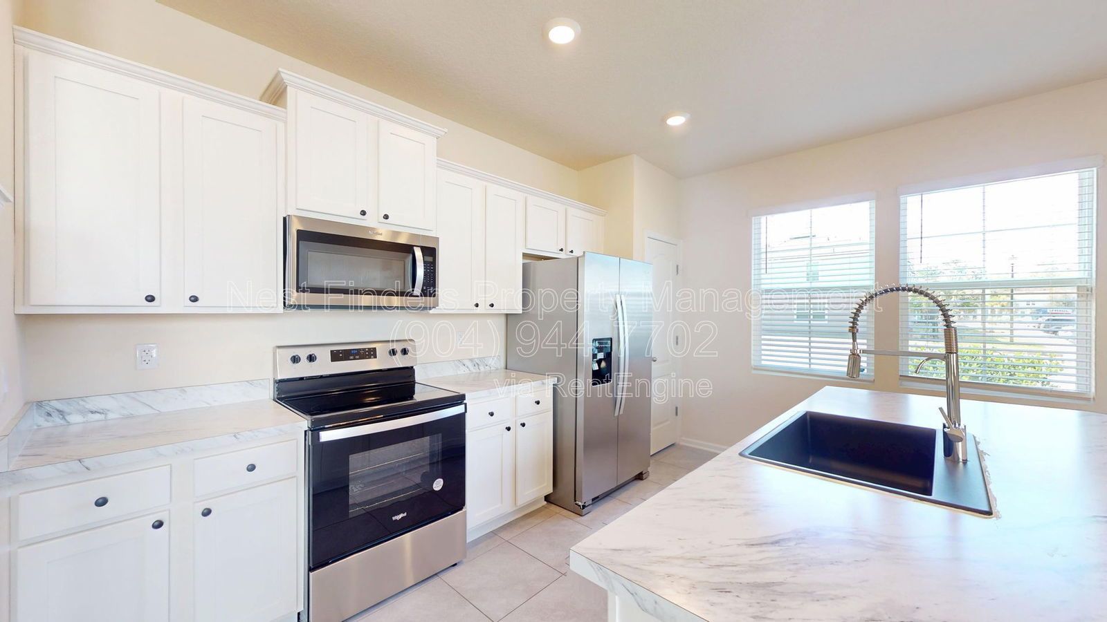 Charming three-bedroom, 2.5-bathroom end-unit townhome for rent in the desirable Rivergate community property image