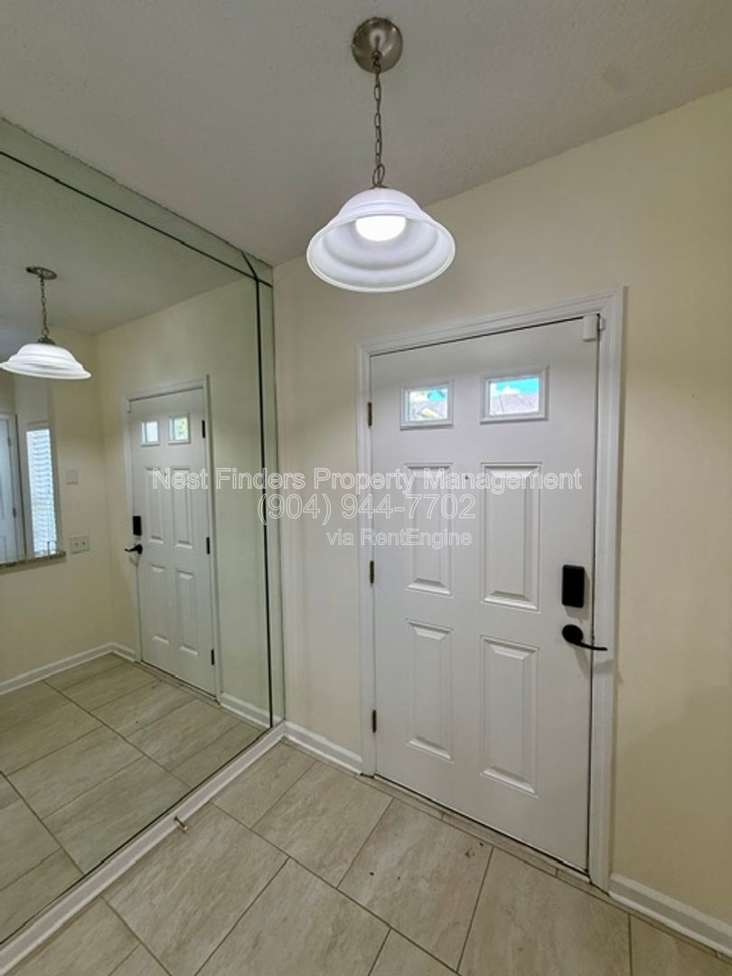 Beautifully updated end-unit townhome located in the gated community of Seasons at Kensington, property image