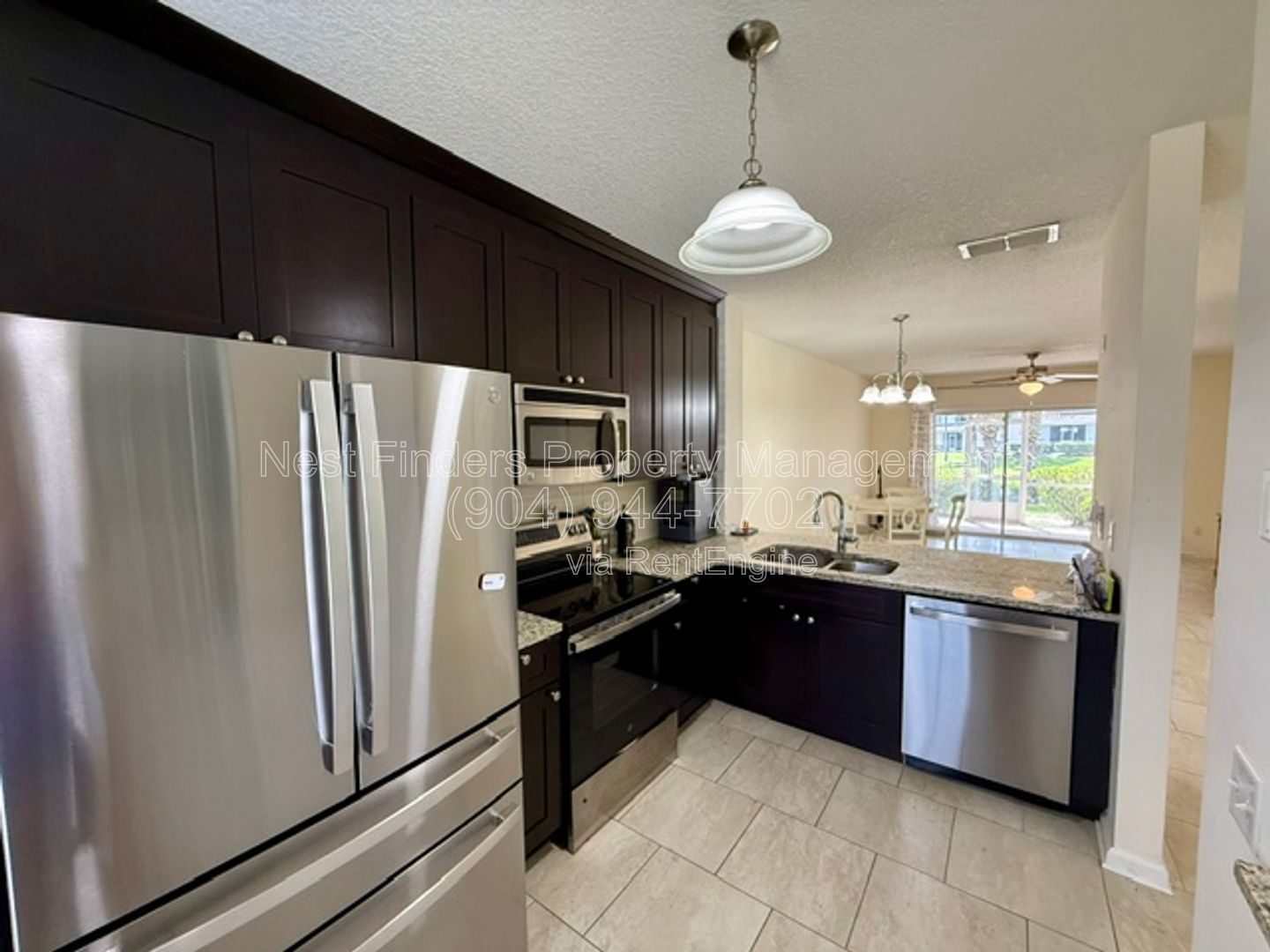 Beautifully updated end-unit townhome located in the gated community of Seasons at Kensington, property image