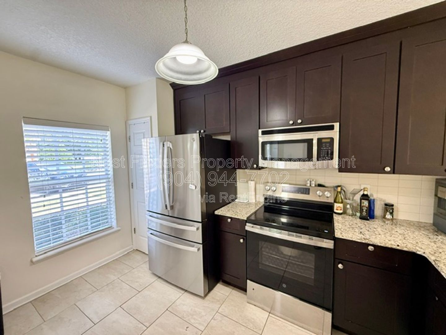 Beautifully updated end-unit townhome located in the gated community of Seasons at Kensington, property image