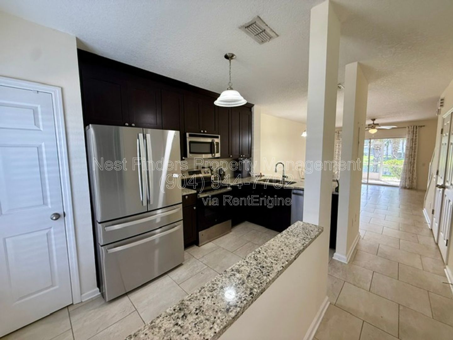 Beautifully updated end-unit townhome located in the gated community of Seasons at Kensington, property image