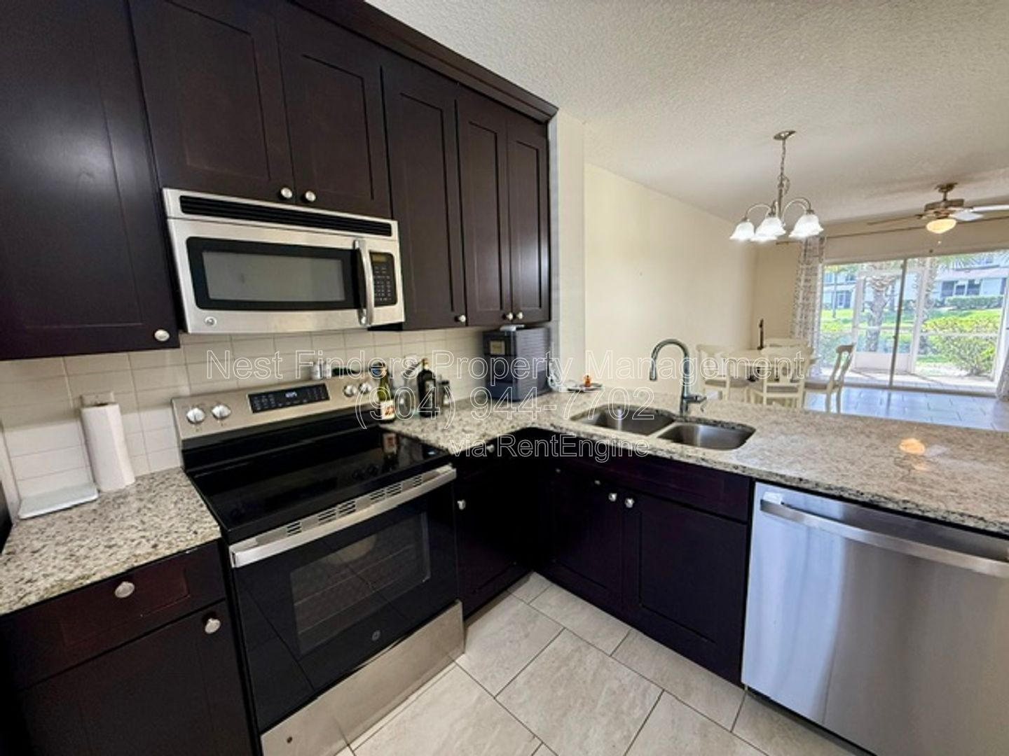 Beautifully updated end-unit townhome located in the gated community of Seasons at Kensington, property image