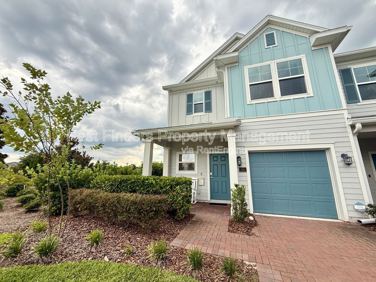 BEAUTIFUL END-UNIT TOWNHOME WITH SCREENED PATIO AND LAKE VIEWS property image