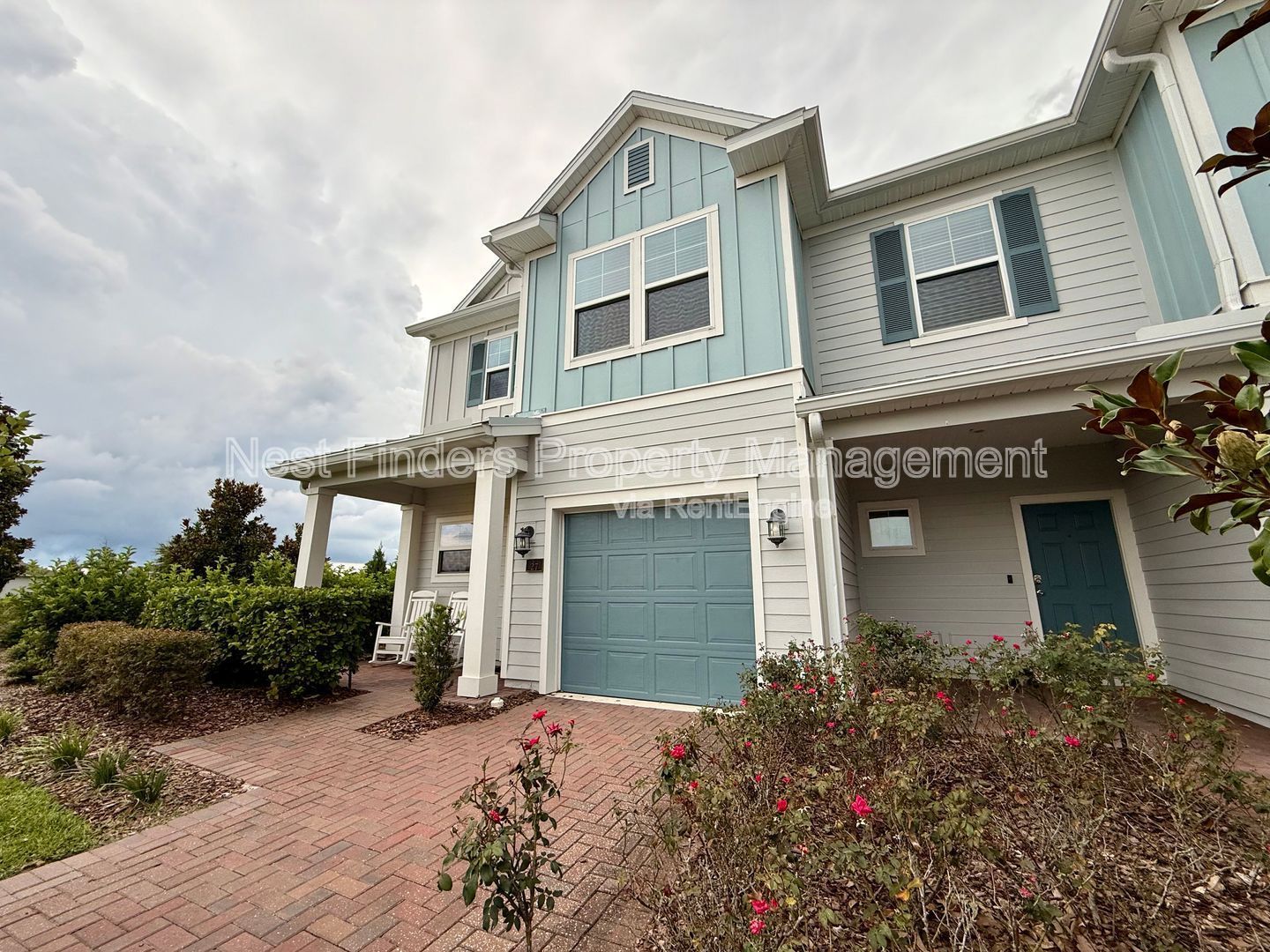 BEAUTIFUL END-UNIT TOWNHOME WITH SCREENED PATIO AND LAKE VIEWS property image