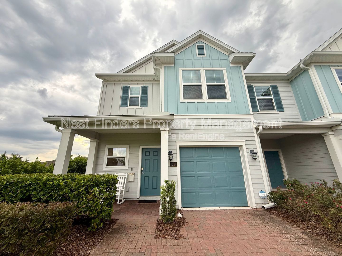 BEAUTIFUL END-UNIT TOWNHOME WITH SCREENED PATIO AND LAKE VIEWS property image