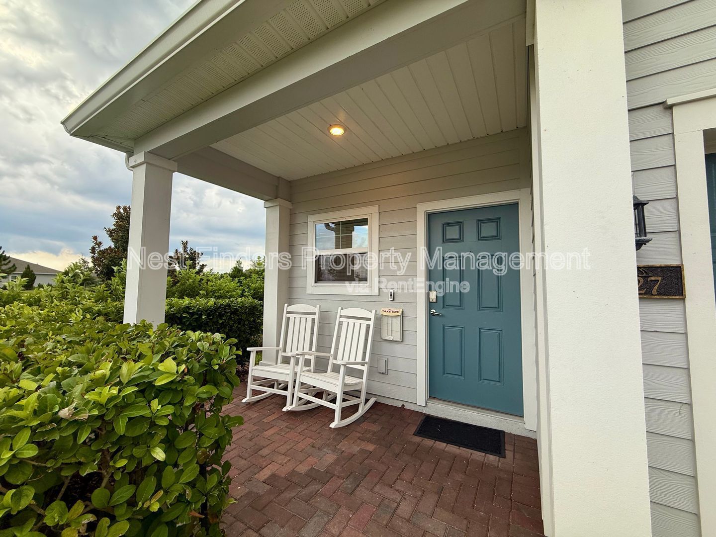 BEAUTIFUL END-UNIT TOWNHOME WITH SCREENED PATIO AND LAKE VIEWS property image