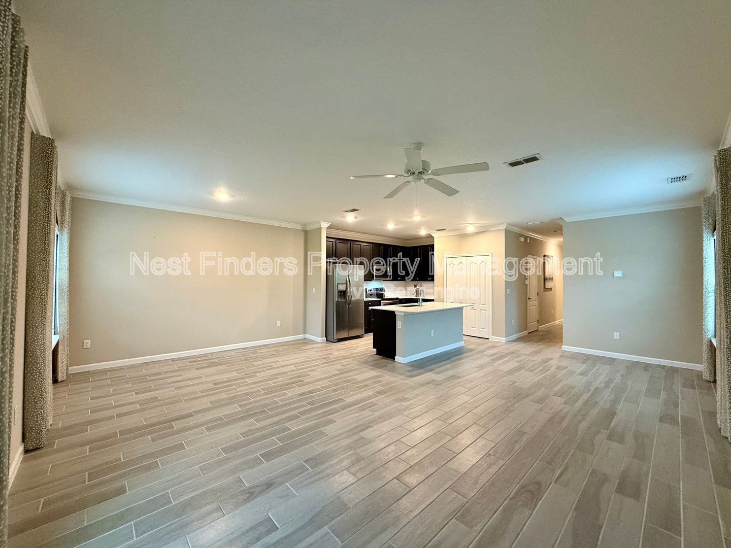 BEAUTIFUL END-UNIT TOWNHOME WITH SCREENED PATIO AND LAKE VIEWS property image