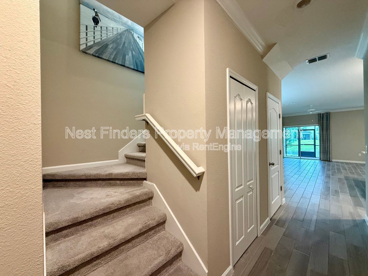 BEAUTIFUL END-UNIT TOWNHOME WITH SCREENED PATIO AND LAKE VIEWS property image