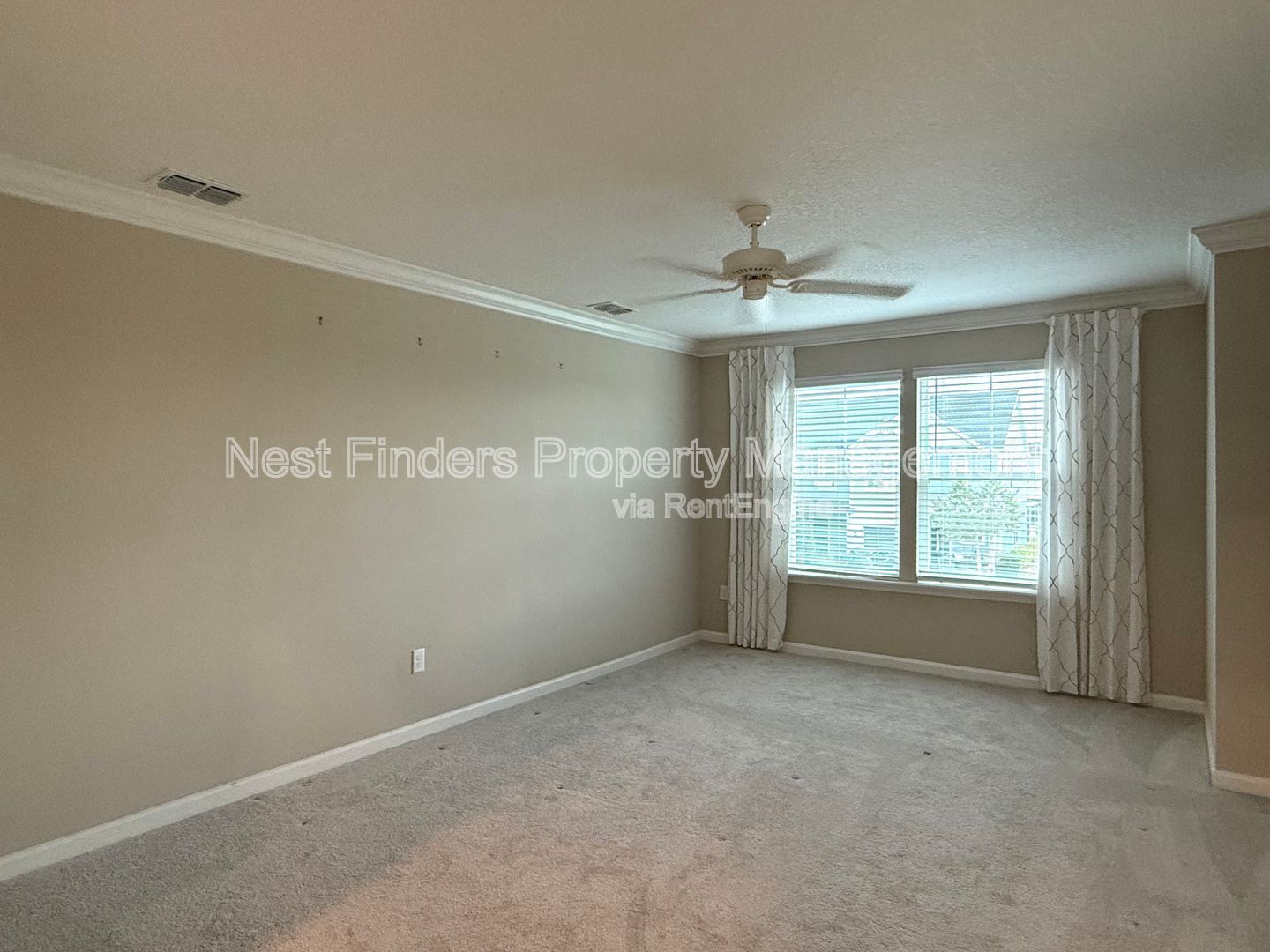 BEAUTIFUL END-UNIT TOWNHOME WITH SCREENED PATIO AND LAKE VIEWS property image