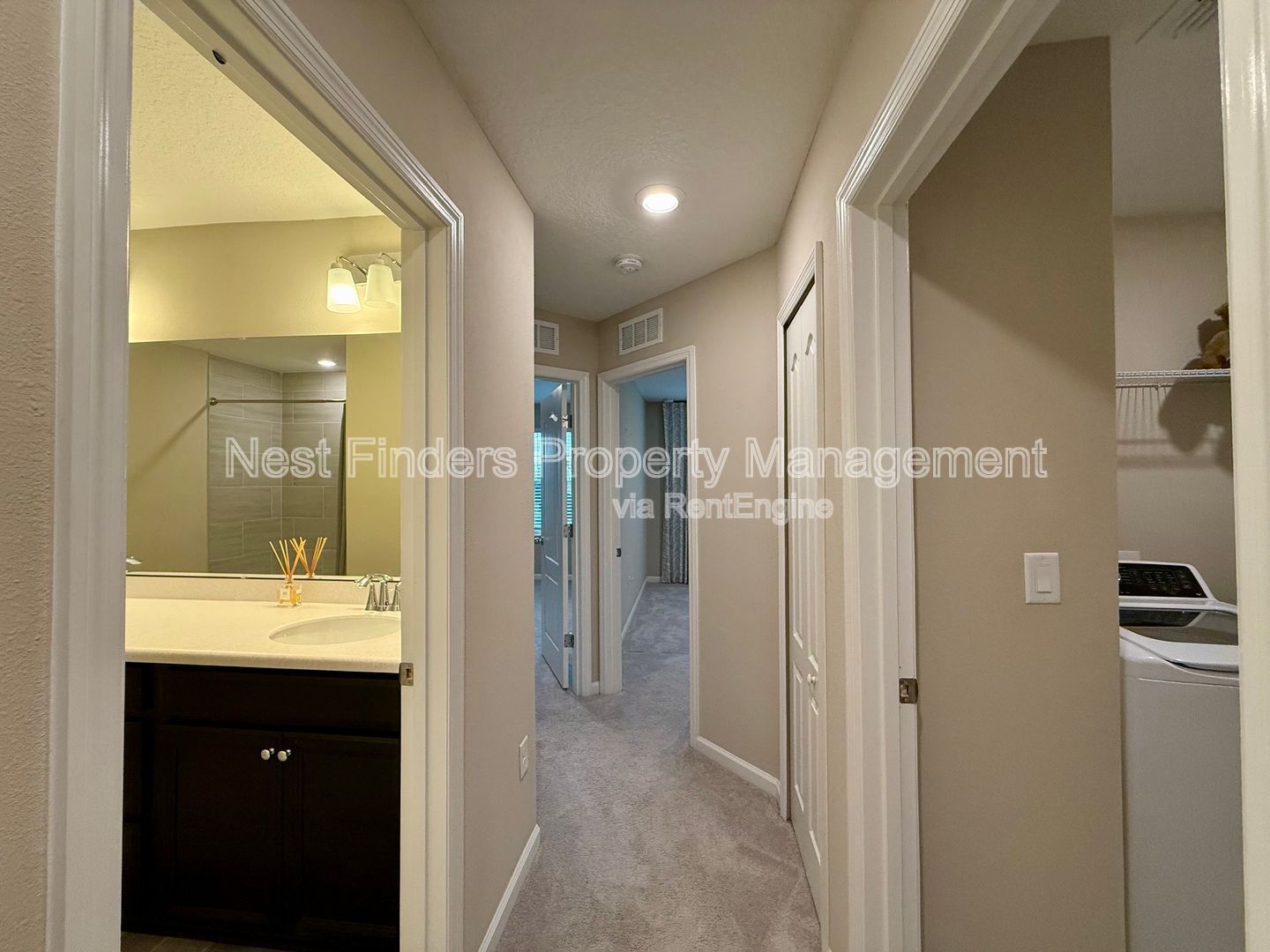 BEAUTIFUL END-UNIT TOWNHOME WITH SCREENED PATIO AND LAKE VIEWS property image