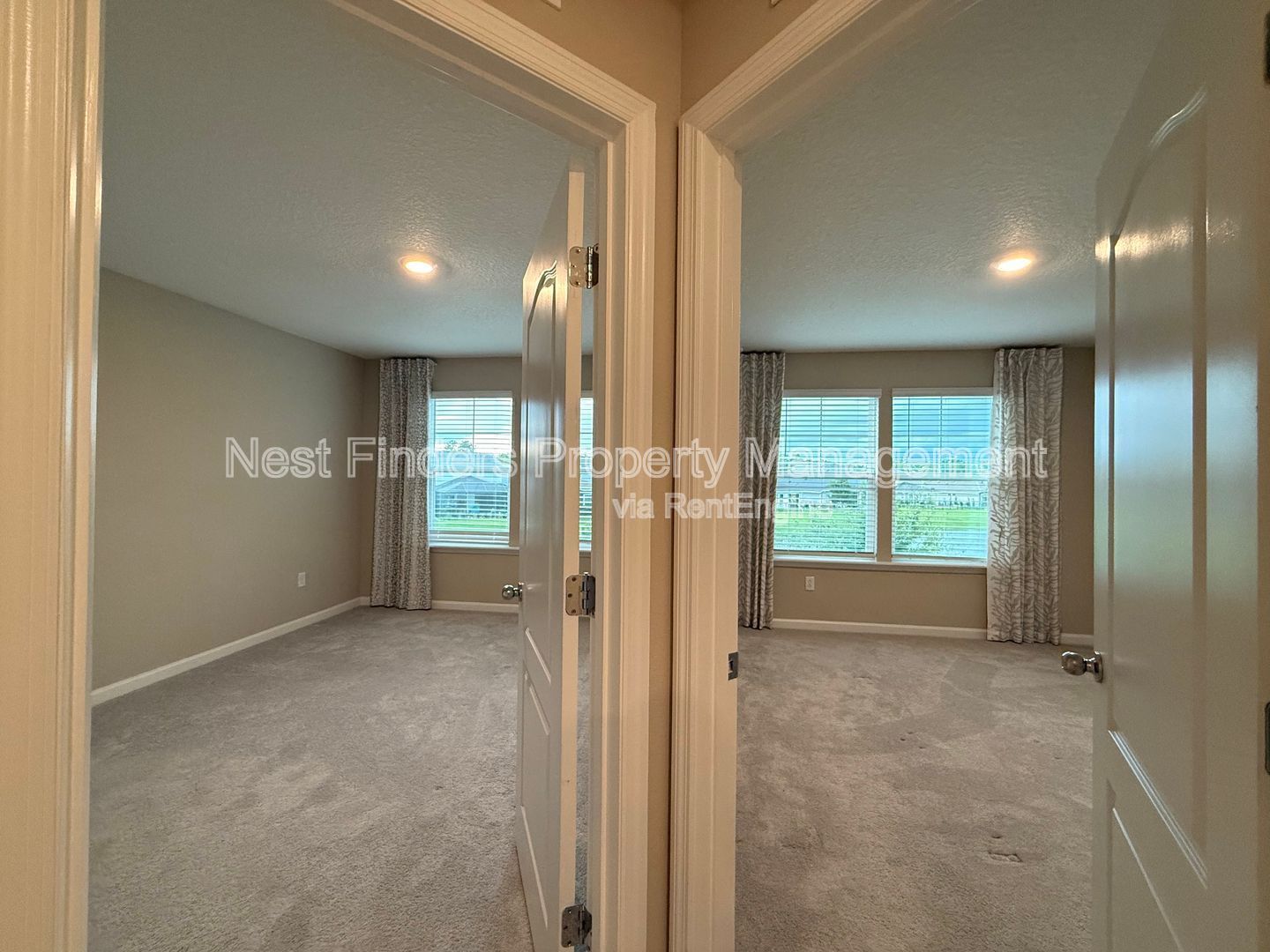 BEAUTIFUL END-UNIT TOWNHOME WITH SCREENED PATIO AND LAKE VIEWS property image