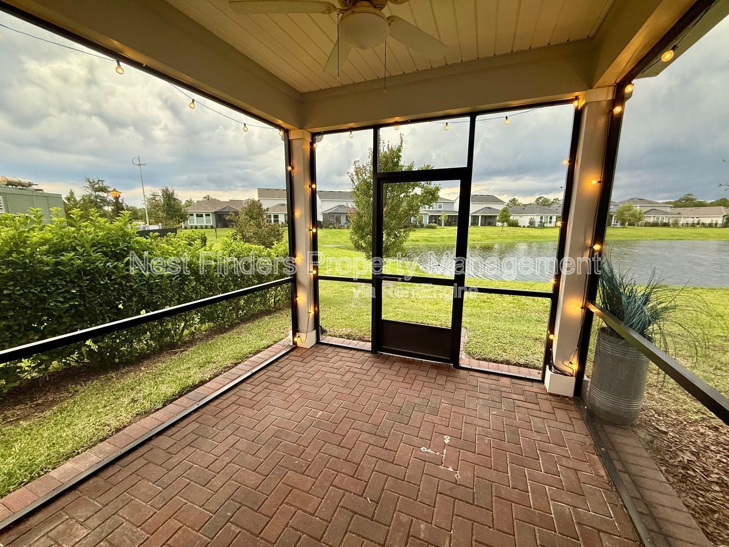 BEAUTIFUL END-UNIT TOWNHOME WITH SCREENED PATIO AND LAKE VIEWS property image