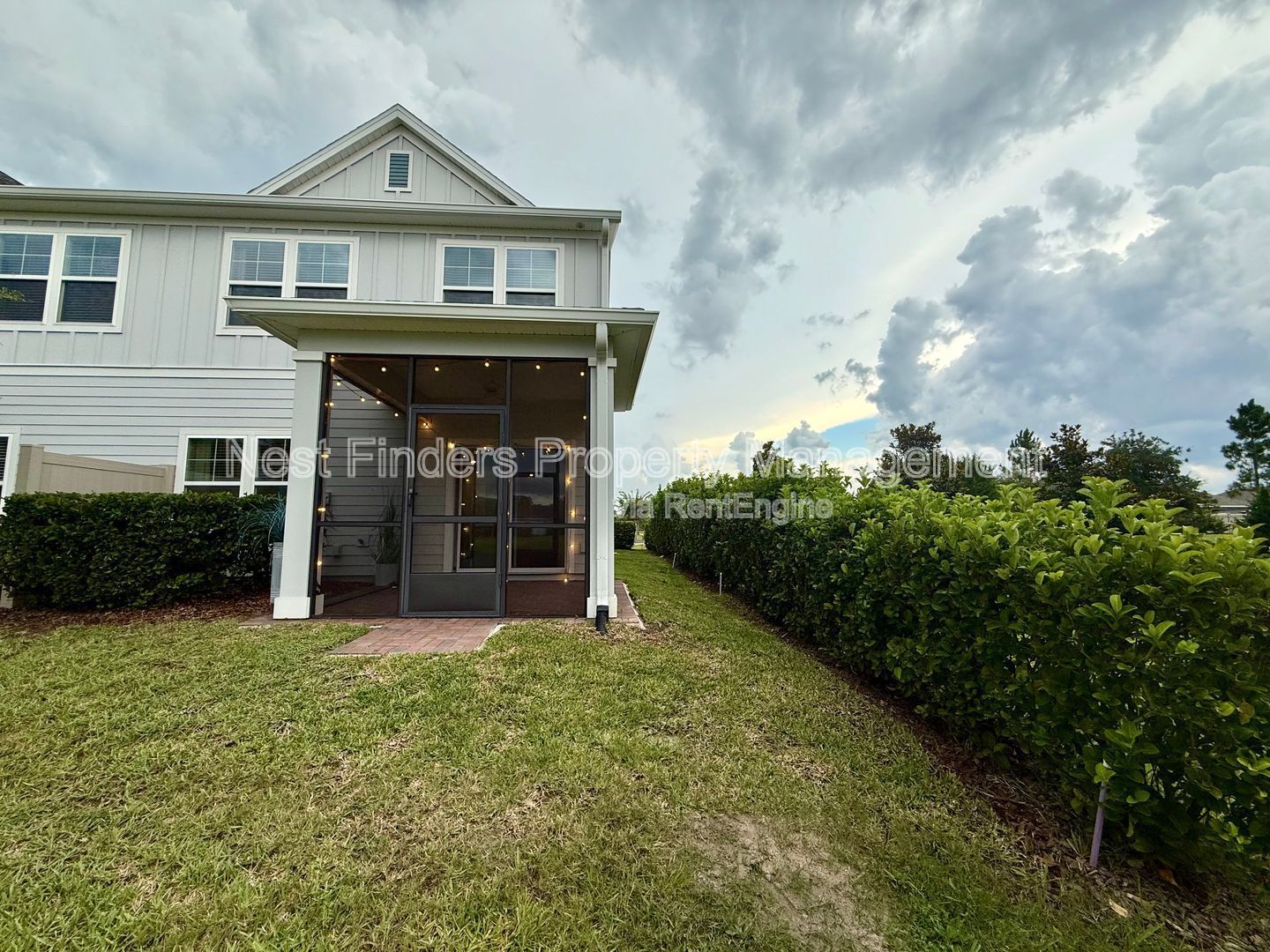BEAUTIFUL END-UNIT TOWNHOME WITH SCREENED PATIO AND LAKE VIEWS property image
