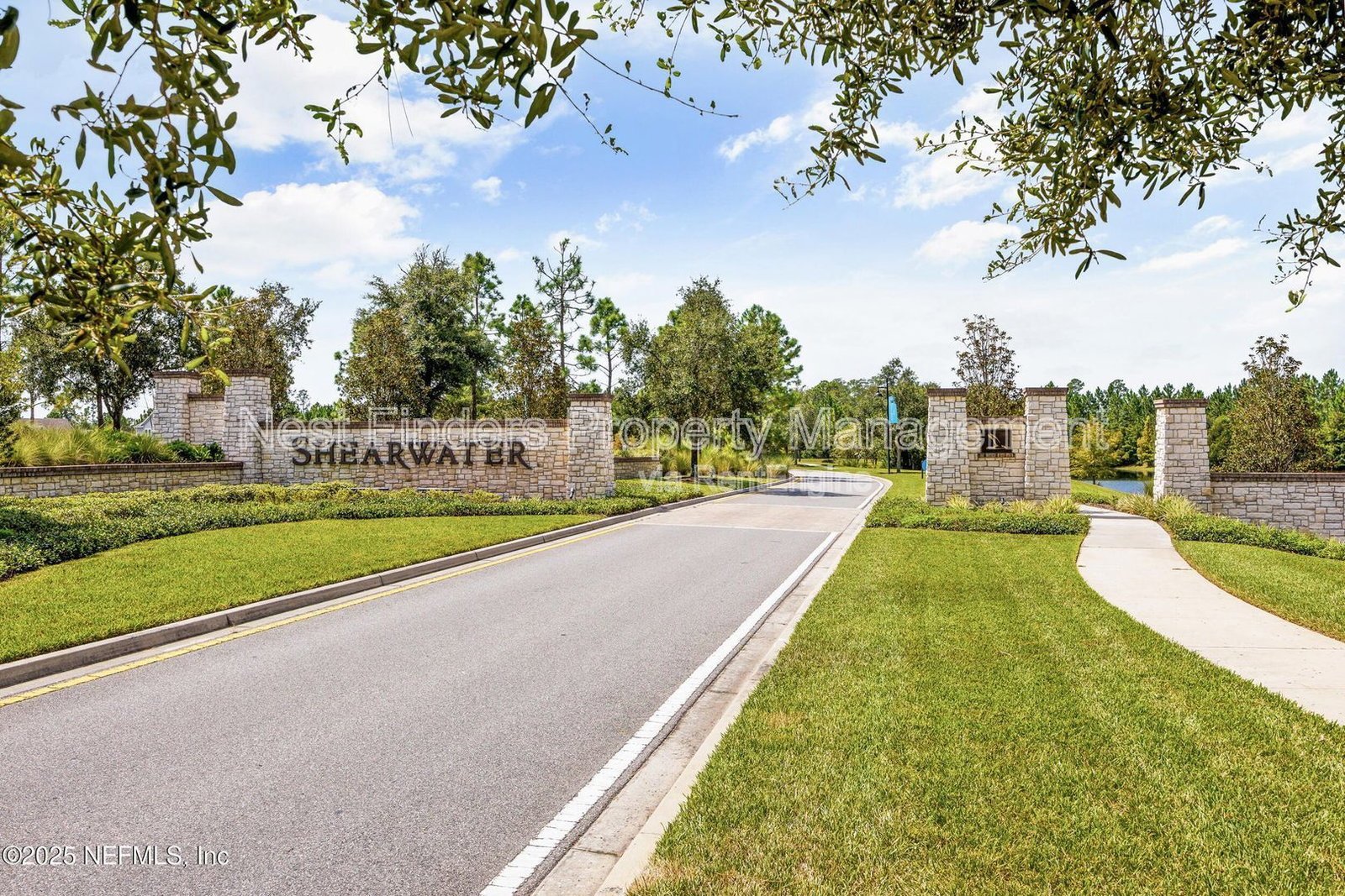 BEAUTIFUL END-UNIT TOWNHOME WITH SCREENED PATIO AND LAKE VIEWS property image